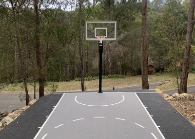 grey backyard basketball court