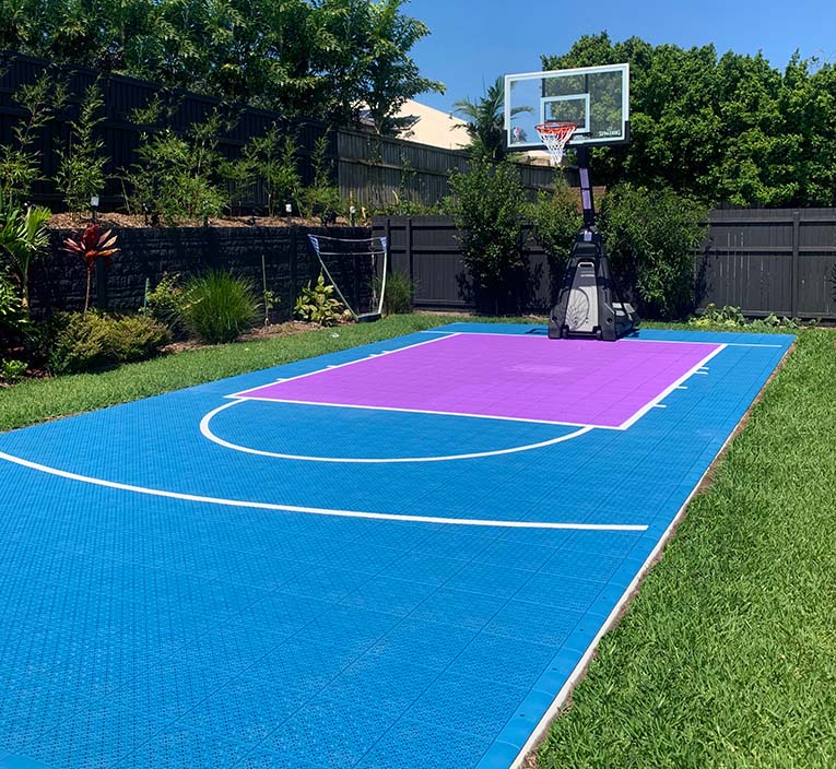 purple and blue backyard basketball court